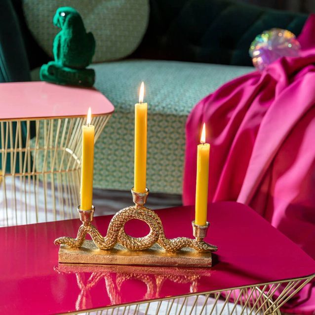 Portavelas de serpiente